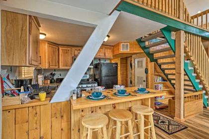 Overgaard Cabin with Hot Tub Fire Pit and Deck! - image 7